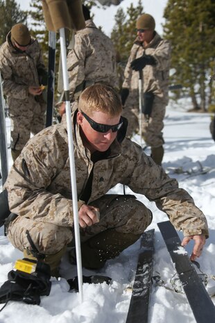 Marine Corps Mountain Warfare Training Center, Bridgeport, Calif. – A Marine from 2nd Battalion, 2nd Marine Regiment, 2nd Marine Division, applies wax to his skis at the Marine Corps Mountain Warfare Training Center at Bridgeport, Calif. The Marines began their pre-environmental training and basic mobility training during a 10-day field exercise on January 18, 2014. During the training evolution the Marines will learn skiing, snowshoeing, skijoring, limited cliff assault, endurance at elevation and long-range day and night movements. The Warlords and its attached units are undergoing training at MCMWTC to prepare for the upcoming bilateral NATO training exercise Cold Response, which will take place in March of 2014 in Norway.