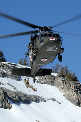 Marine Corps Mountain Warfare Training Center, Bridgeport, Calif. – Soldiers from the California National Guard evacuate a simulated casualty during Mountain Exercise cold weather training package. During the Mountain Exercise the Warlords of 2nd Battalion, 2nd Marine Regiment, 2nd Marine Division will learn the tools necessary to survive and fight in a mountainous and cold environment. The Warlords and its attached units are undergoing training at MCMWTC to prepare for the upcoming bilateral NATO training exercise Cold Response, which will take place in March of 2014 in Norway.