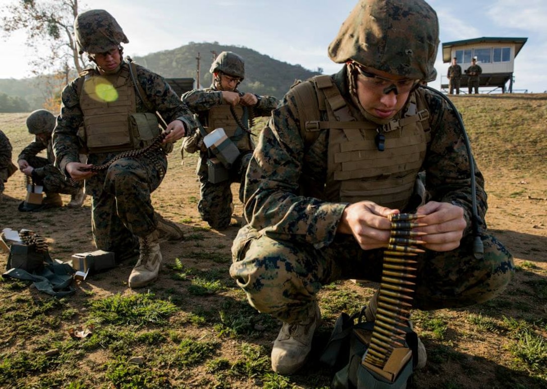 Marines training to be machine gunners break up their ammunition into different lengths before starting a sequence of fire on range 218A in the 53-area of Camp Pendleton, Jan. 28. The Marines are students with Delta Co., Infantry Training Battalion, School of Infantry-West and are training to be basically qualified in the 0331 MOS. 

Infantry Training Battalion trains all infantry, entry-level Marines in the infantry skills essential to operating combat environment. Infantry Training Battalion is a 52-day training course that transforms the raw Marine into an infantryman who can fight, survive, and win in a combat situation.

