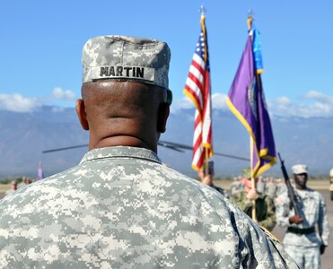 Joint Task Force-Bravo Command Sgt. Maj. Valmond A. Martin stands at attention during a retirement ceremony conducted in his honor at Soto Cano Air Base, Honduras, Jan. 29, 2014. Martin enlisted in the U.S. Army in 1983 and has served in for more than 31 years. (U.S. Air Force photo by Capt. Zach Anderson)