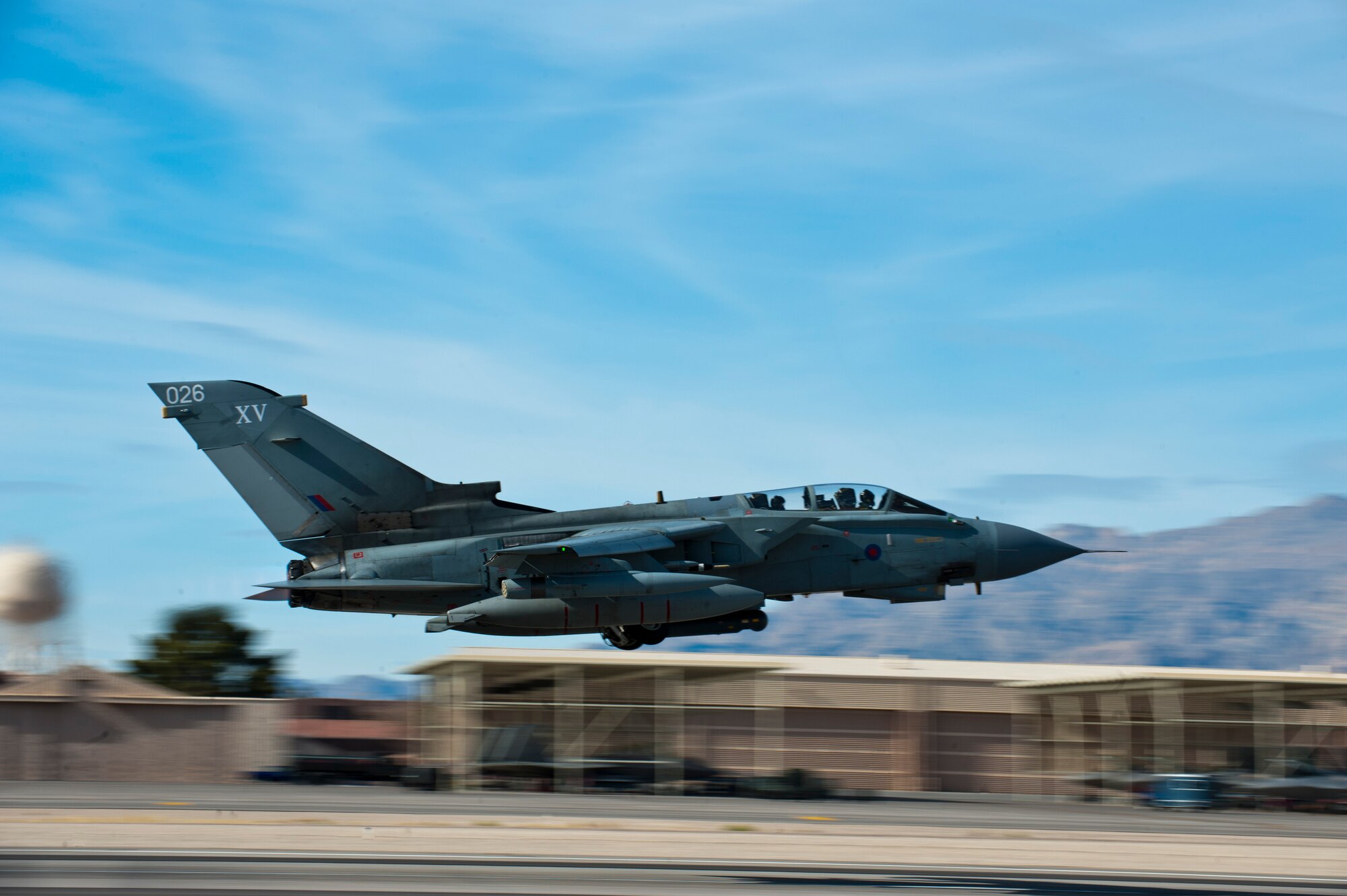 A Royal Air Force Tornado GR4 assigned to the IX Bomber Squadron from Royal Air Force Station Marham, United Kingdom, takes off during Red Flag 14-1 Jan. 28, 2014, at Nellis Air Force Base, Nev. Red Flag gives aircrews and air support operations service members from various airframes, military services and allied countries an opportunity to integrate and practice combat operations. These situations provide the pilots with real-time war scenarios and also helps ground crews test and improve their combat readiness. (U.S. Air Force photo by Airman 1st Class Thomas Spangler)  