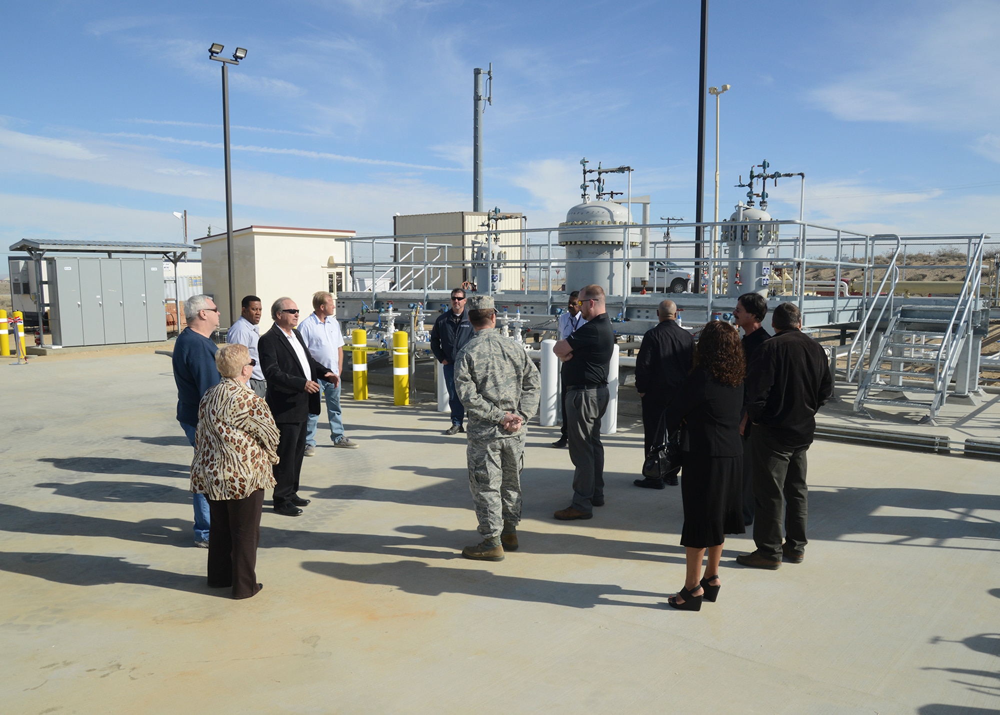 Kinder Morgan Energy Partner executives gave a tour of the new metering station Jan. 22 before the formal ribbon cutting ceremony.  (U.S. Air Force photo by Kenji Thuloweit)