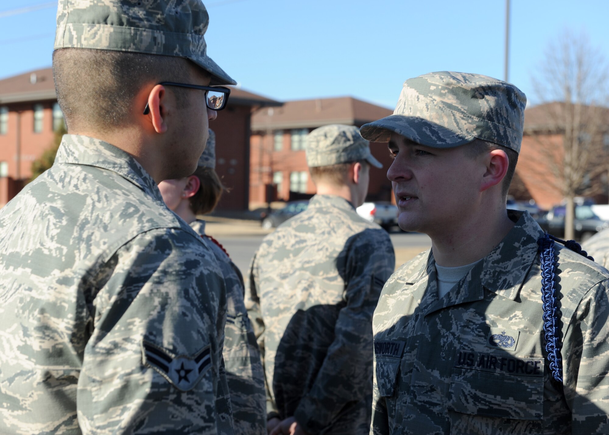Staff Sgt. Jeremy Farnsworth, a 714th Training Squadron military training leader, performs an open ranks inspection of non-prior service Airmen Jan. 28, 2014, at Little Rock Air Force Base, Ark. Farnsworth has been responsible for leading the professional development of 80 Airmen enrolled in C-130 loadmaster qualification training. (U.S. Air Force photo by Airman 1st Class Scott Poe)