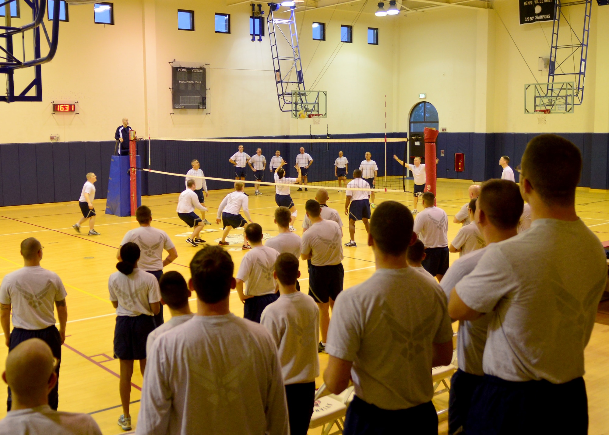 Airman Leadership School students compete against 31st Fighter Wing leadership during a volleyball tournament, Jan. 13, 2014, at Aviano Air Base, Italy. ALS is a five week class that tests the minds of future supervisors and arms them with tools needed to succeed as a leader. (U.S. Air Force photo/Senior Airman Briana Jones)