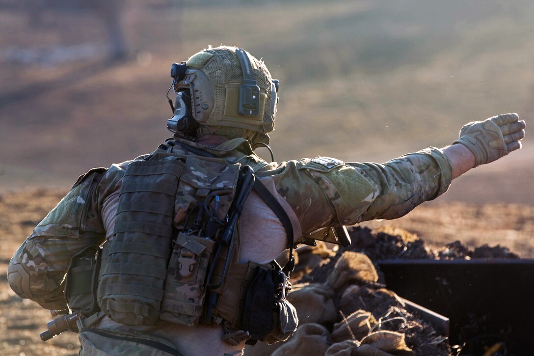 An Army Ranger directs fire at designated targets during live-fire training on Fort Hunter Liggett, Calif., Jan. 23, 2014. The Rangers are assigned to Company B, 2nd Battalion, 75th Ranger Regiment. The training enables the soldiers to maintain proficiency on their tactical skills.