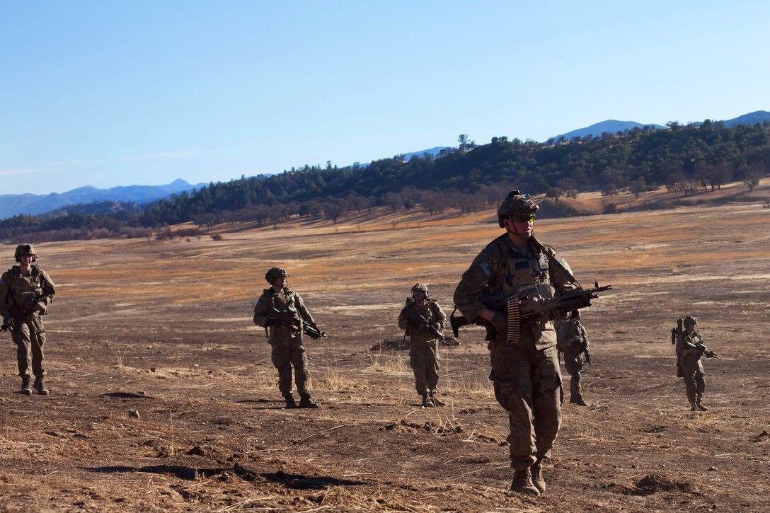 Army Rangers move out to their objectives during Task Force training on Fort Hunter Liggett, Calif., Jan. 22, 2014. The Rangers, assigned to the 2nd Battalion, 75th Ranger Regiment, conduct rigorous training to maintain their tactical proficiency.
