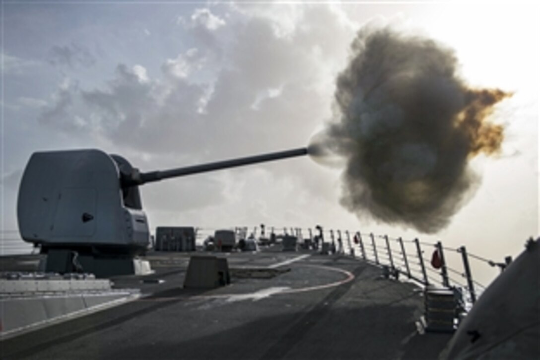 The guided-missile destroyer USS Stout fires its Mk-45 5-inch lightweight gun during a live-fire exercise in the Mediterranean Sea, Jan. 27, 2014. The Stout is supporting maritime security operations and theater security cooperation efforts in the U.S. 6th Fleet area of responsibility.