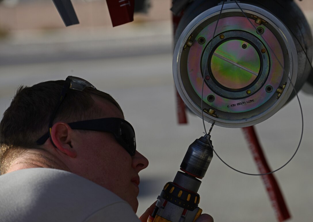 Staff Sgt. Matthew O'Neal replaces a faulty bracket on an inert GBU-12 munition Jan. 28, 2014, at Nellis Air Force Base, Nev. O'Neal is participating in the combat exercise Red Flag 14-1, whichh gives Airmen an opportunity to experience realistic combat scenarios to prepare and train Airmen in the event of future conflicts or war. O’Neal is a 366th Equipment Maintenance Squadron aircraft structural maintainer. (U.S. Air Force photo/Senior Airman Benjamin Sutton)