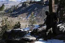 Cpl. Corey D. Brown, an embarkation specialist with Ragnarok Company, 2nd Supply Battalion, 2nd Marine Logistics Group, rests after climbing a steep section of a mountain trail aboard the Mountain Warfare Training Center in Bridgeport, Calif., Jan. 18, 2014. Brown, a Pensacola, Fla., native, was one of 228 Marines and sailors with 2nd MLG assigned to the Cold Response 2014 mission, an upcoming NATO exercise in Norway. 