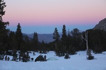 Service members with Ragnarok Company, 2nd Supply Battalion, 2nd Marine Logistics Group set up camp in the snow aboard the Mountain Warfare Training Center in Bridgeport, Calif., Jan. 20, 2014. The service members encamped and received training at approximately 10,000 feet above sea level for a week while preparing for Cold Response 2014, a NATO exercise in Norway.
