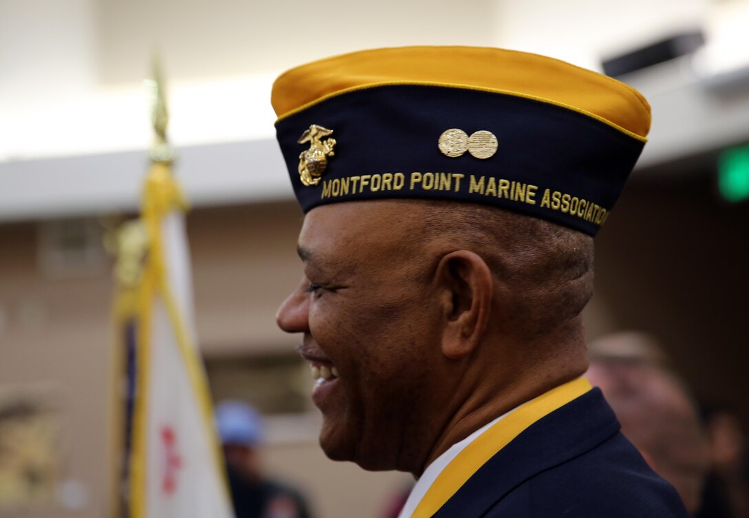 Michael Johnson, veteran, Montford Point Marine Association, smiles during a Congressional Gold Medal Ceremony honoring former Montford Point Marine Freeman Stokes at Banning City Hall in Banning, Calif., Jan. 25, 2014.