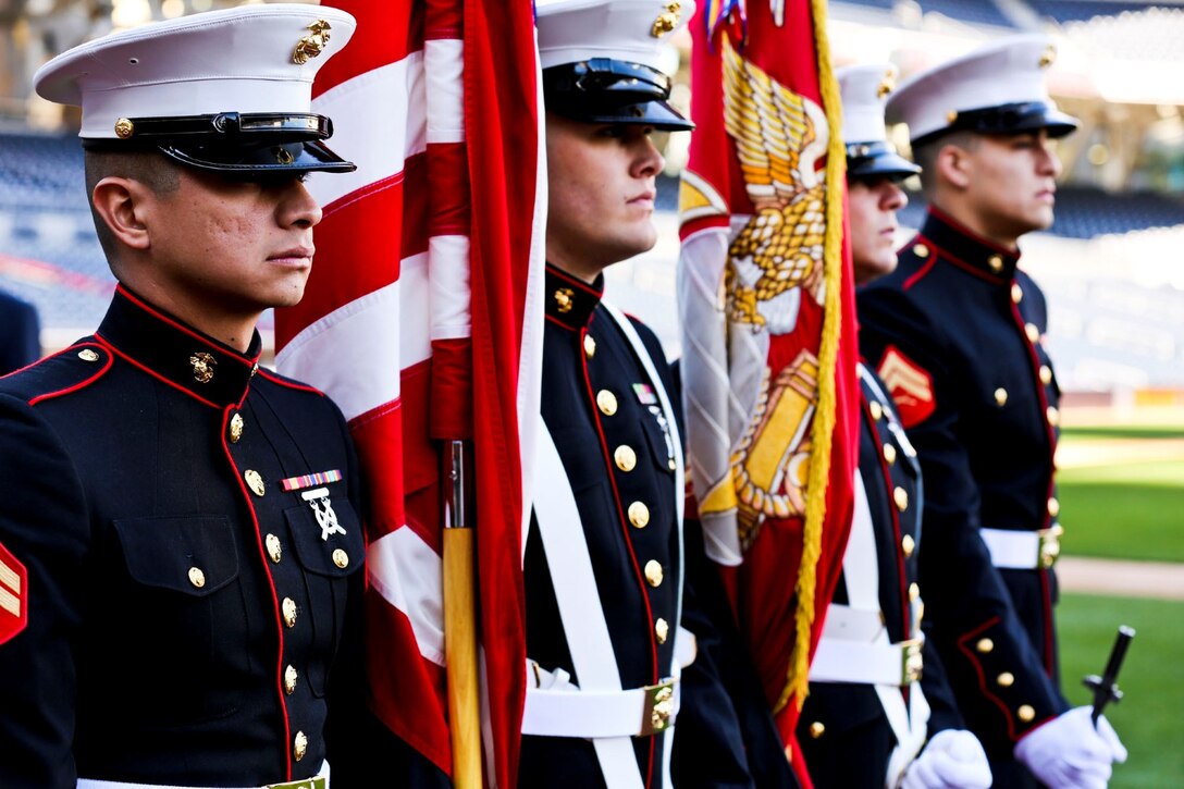 The I Marine Expeditionary Force, I Marine Headquarters Group colorguard stands ready to march out to the field during a memorial service to honor Jerry Coleman in San Diego, Jan. 18. Coleman, a former Major League Baseball player and announcer, served in two wars as a Marine pilot.

Read more: http://www.dvidshub.net/image/1155137/marines-salute-jerry-coleman#.Uuqu8PldXng#ixzz2ruiDlqSl