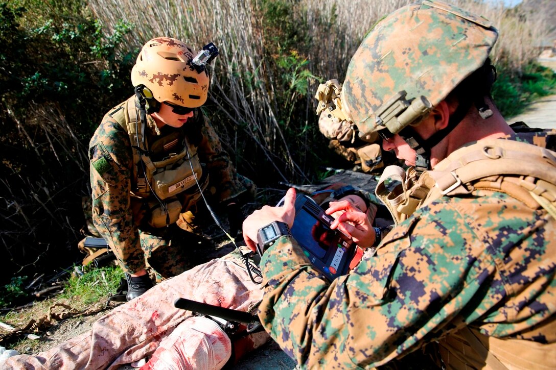 Marines and Sailors conduct operational trials of the Tempus Pro, a tactical telemedicine device, over two days of testing aboard Camp Pendleton, Calif., Jan. 22-23. The Tempus Pro attaches to the patient and broadcasts their vital signs back to a battalion aid station or aiding physician so that they can instruct and help the corpsman.