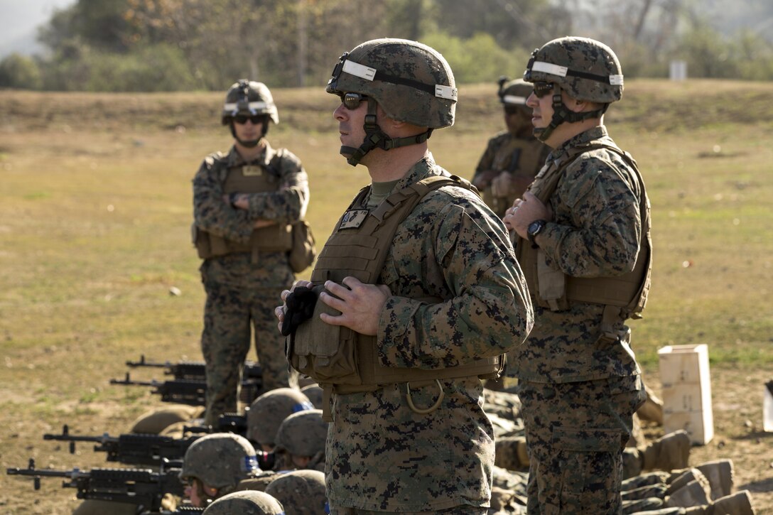 Instructors watch rounds impact targets down range as their students perform a course of fire on range 218A in the 53-area of Camp Pendleton on Jan. 28. The students are training to be basically qualified 0331 machine gunners.

Infantry Training Battalion trains all infantry, entry-level Marines in the infantry skills essential to operating combat environment. Infantry Training Battalion is a 52-day training course that transforms the raw Marine into an infantryman who can fight, survive, and win in a combat situation.