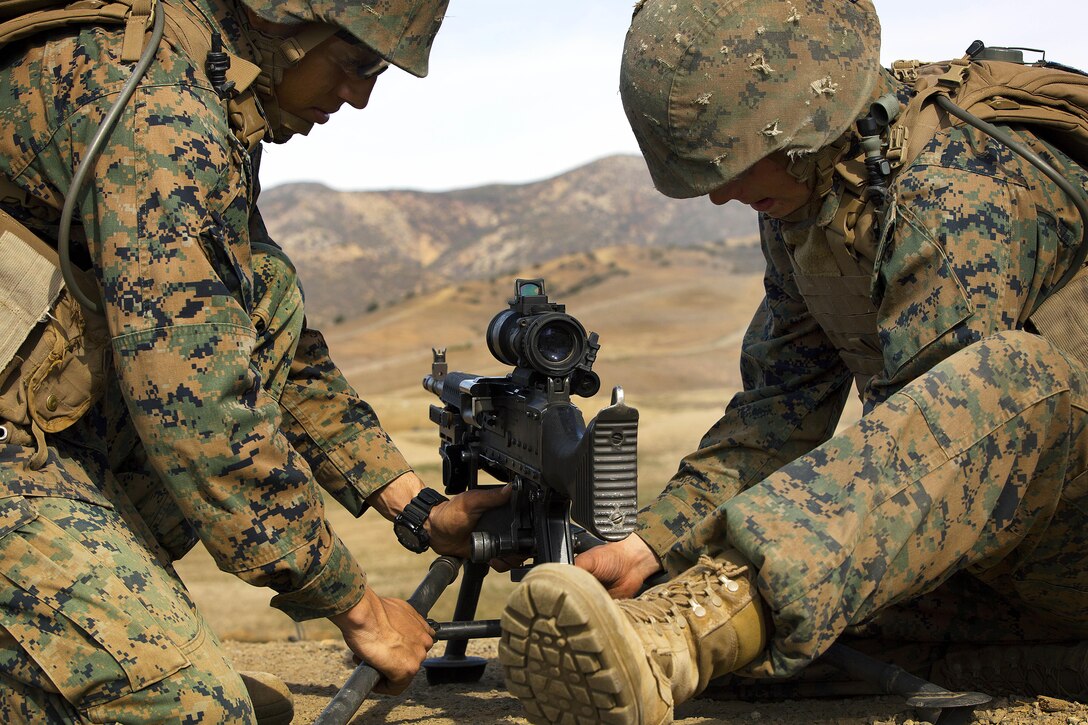 Students set up a M240B machine gun on range 218A during a Delta Company, Infantry Training Battalion, School of Infantry-West in the 53-area of Camp Pendleton, Jan. 28.

Infantry Training Battalion trains all infantry, entry-level Marines in the infantry skills essential to operating combat environment. Infantry Training Battalion is a 52-day training course that transforms the raw Marine into an infantryman who can fight, survive, and win in a combat situation.
