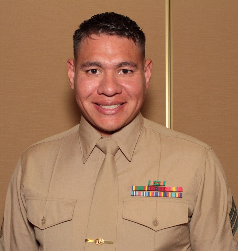 Sergeant Marcos A. Valentin, career planner, 1st Reconnaissance Battalion, was named “Career Planner of the Year” for 1st Marine Division during the 1st Marine Division Annual Career Planning Awards Luncheon at Marine Corps Base Camp Pendleton, Calif., Jan. 27, 2014. He was also awarded the Navy and Marine Corps Achievement Medal for his accomplishments. Valentin met his retention goal of more than 200 percent during 2013. He is required to interview each of the elite infantrymen that he supports at least two to three times during their careers. In order to accommodate their busy training and deployment schedules, he interviewed many of them during field training and also during early mornings and late nights. He is only one of many career planners who serve more than 25,000 combat-ready Marines and Sailors throughout 1st Marine Division. Valentin, a 27-year-old native of Mira Mesa, San Diego, and 2004 graduate of Mira Mesa High School, reported to Marine Corps Recruit Depot San Diego for recruit training nearly nine years ago Mar. 7, 2005. He plans to make the Marine Corps a career. 
(U.S. Marine Corps photo by Sgt. Jacob H. Harrer / released)

