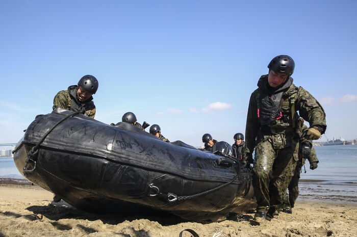 Soldiers with the Japan Ground Self-Defense Force practice amphibious landing techniques while conducting Helo Cast training during Exercise Iron Fist 2014 aboard Naval Amphibious Base Coronado, Calif., Jan. 27, 2014. Iron Fist is an amphibious exercise that brings together Marines and sailors from the 15th Marine Expeditionary Unit, other I Marine Expeditionary Force units, and soldiers from the JGSDF, to promote military interoperability and hone individual and small-unit skills through challenging, complex and realistic training. (U.S. Marine Corps photo by Cpl. Emmanuel Ramos/Released)