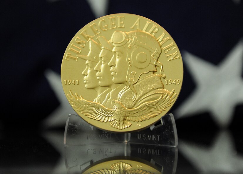 Tuskegee Airman Romaine Goldsborough congressional medal awarded to the Tuskegee Airman by President George W. Bush as he saluted them for their honorable service.  The medal is now on display at the Grey Geese room at the Binnicker Professional Military Center at Joint Base Pearl Harbor-Hickam, Hawaii. The Tuskegee Airmen were recruited into an Army Air Corps program that trained blacks to fly and maintain combat aircraft. President Roosevelt had overruled his top generals and ordered that such a program be created. (U.S. Air Force photo/Master Sgt. Jerome S. Tayborn)