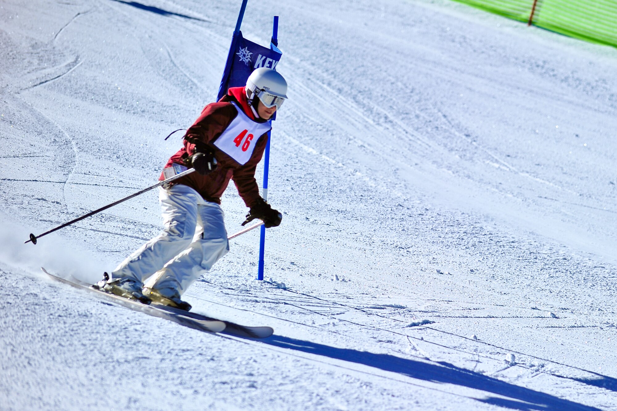 Air Force Reserve Master Sgt. Carli Friss competes in a ski race January 25 during SnoFest at Keystone, Colo. Friss is a member of the 310th Space Wing at Schriever Air Force Base, Colo. SnoFest is an annual winter event hosted by the Colorado front range military bases that features skiing, snowboarding, lodging, parties, giveaways, races and non-skiing events for the military community. (U.S. Air Force photo/Tech. Sgt. Nicholas B. Ontiveros)