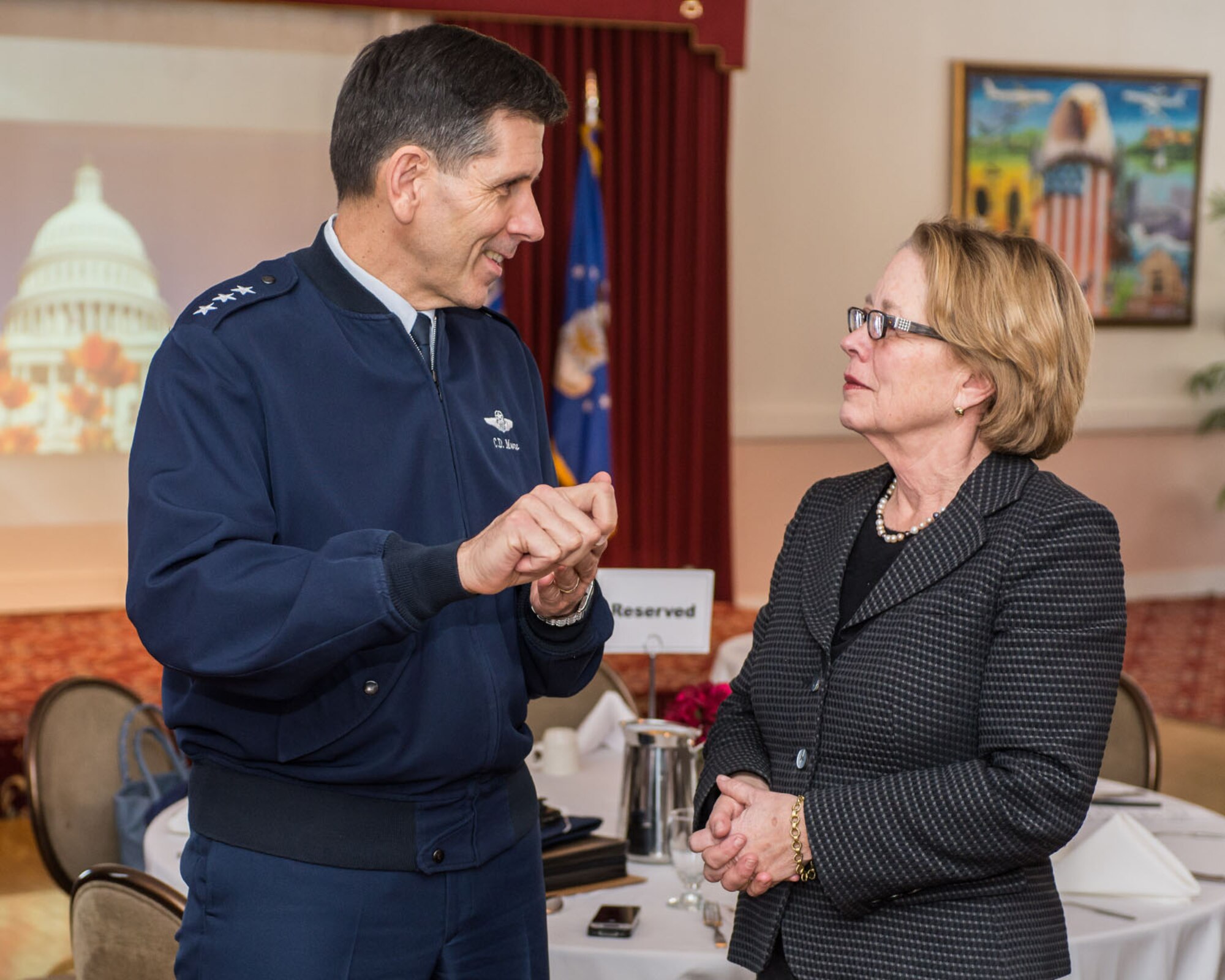 HANSCOM AIR FORCE BASE, Mass. -- U.S. Rep. Niki Tsongas speaks with Lt. Gen. C.D. Moore II, Air Force Life Cycle Management Center commander, before addressing the Boston Chapter of the National Contract Management Association during its monthly meeting Jan. 24 at the Minuteman Commons. Following her presentation, Tsongas met with Moore and state officials to discuss the status of collaboration efforts. (U.S. Air Force photo by Rick Berry)
