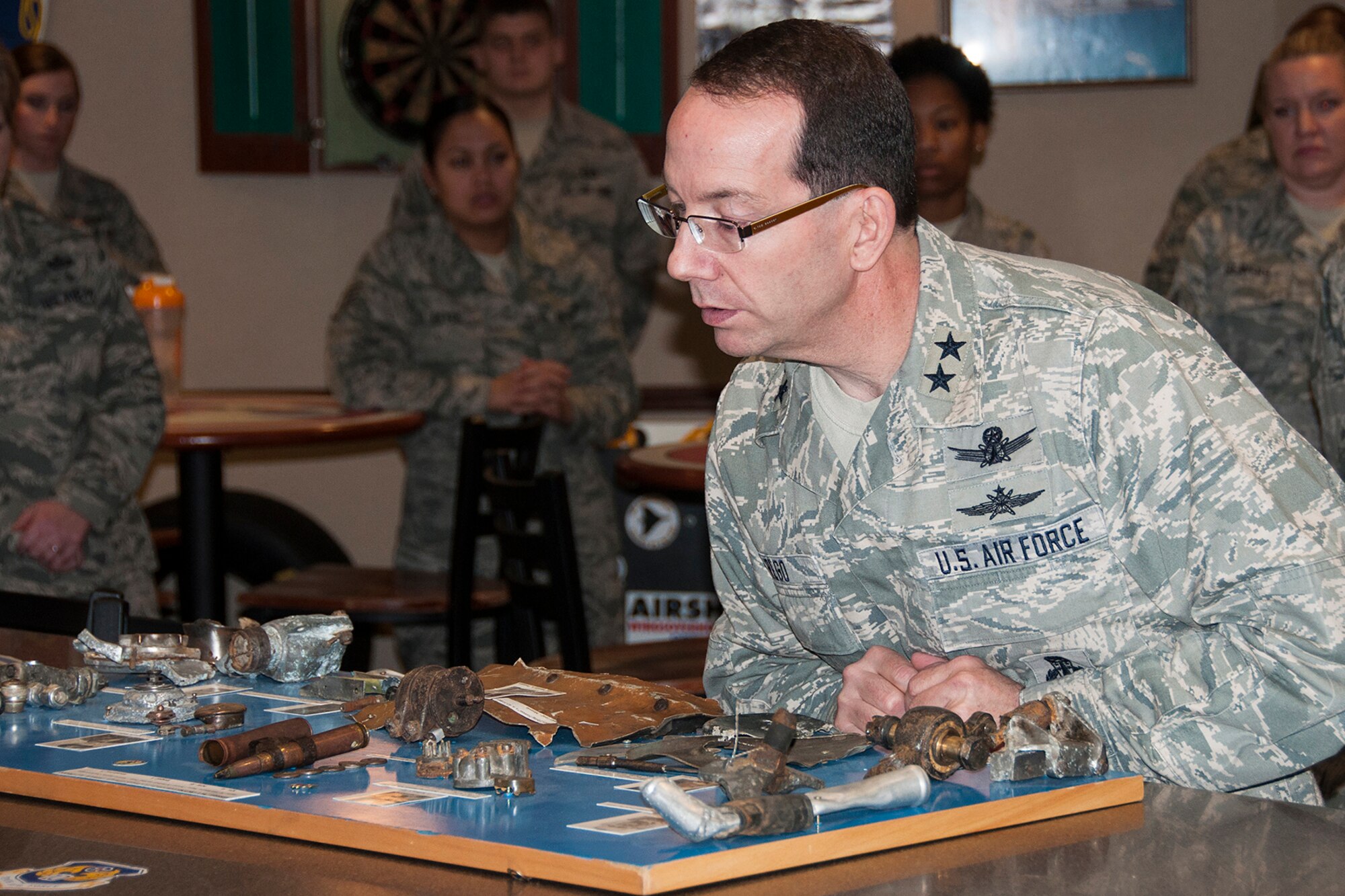 U.S. Air Force Maj. Gen. Robert Rego, Air Force Global Strike Command (AFGSC) vice commander, looks at historical memorabilia during his visit to the 93rd Bomb Squadron, Jan. 26, 2014, Barksdale Air Force Base, La. Rego toured the 307th Bomb Wing during the January Unit Training Assembly as part of an immersion visit to learn more about the mission and Airmen in the wing. (U.S. Air Force photo by Tech. Sgt. Theodore Daigle/Released)
