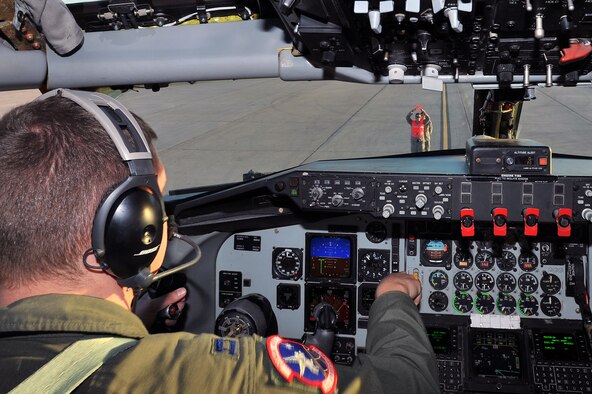 Capt. Ryan Jahnke, 93rd Air Refueling Squadron pilot, is marshalled into an aircraft parking spot after a refueling mission over the Nevada Test and Training Range during Red Flag 14-1 at Nellis Air Force Base, Nev., Jan. 28, 2014.Red Flag has been expanded to incorporate all spectrums of warfare to include command and control, real-time intelligence, analysis and exploitation, and electronic warfare. Night missions have also been added to the exercise. (U.S. Air Force photo by Staff Sgt. Veronica Montes/Released)