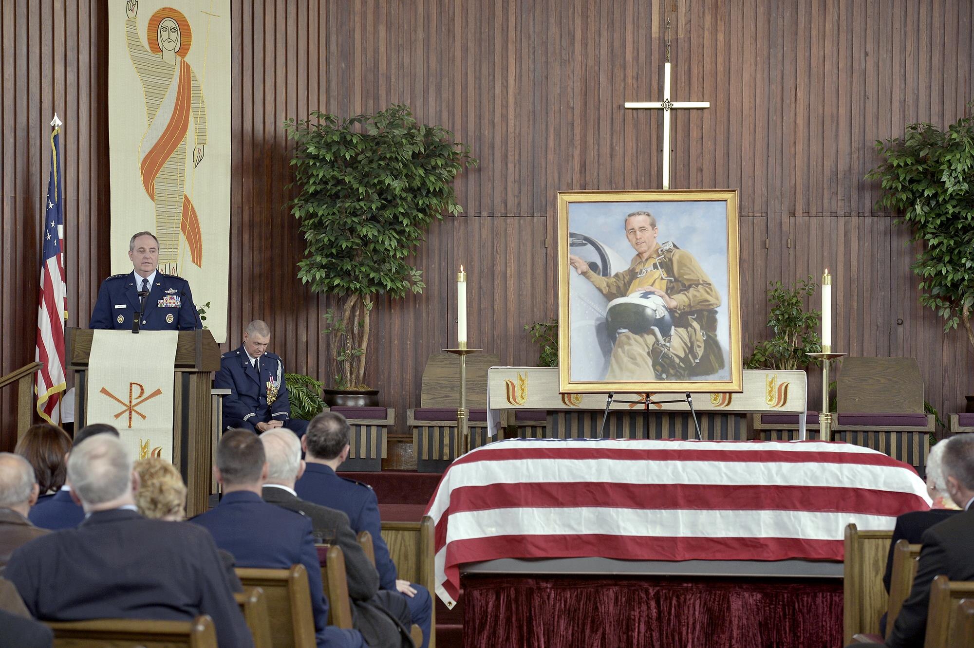 Air Force Chief of Staff Gen. Mark A. Welsh III speaks at the internment ceremony for Brig. Gen. Robinson "Robbie" Risner at the Memorial chapel on Fort Myer, Arlington, Va., before being laid to rest at Arlington National Cemetery, Jan. 23, 2014. Risner was one of the most celebrated pilots in Air Force history and survived seven and a half years of captivity in Hoa Lo Prison, also known as the Hanoi Hilton. (U.S. Air Force photo/Michael J. Pausic)
