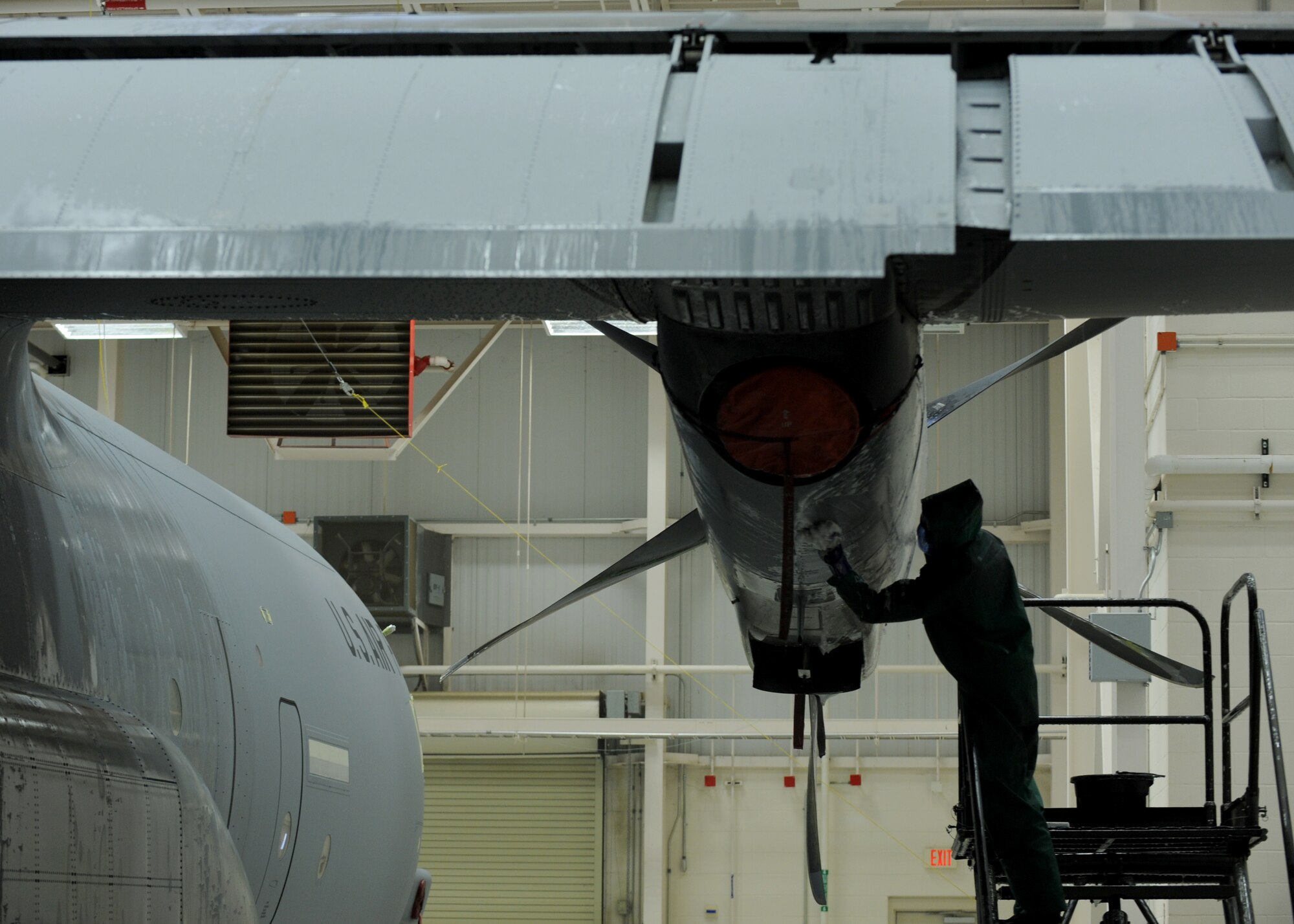 An Airman from the 19th Aircraft Maintenance Squadron cleans a C-130J Jan. 23, 2014, at Little Rock Air Force Base, Ark. Every C-130 is hand washed with aircraft equipment cleaner that is biodegradable and nontoxic. (U.S. Air Force photo by Airman 1st Class Scott Poe)