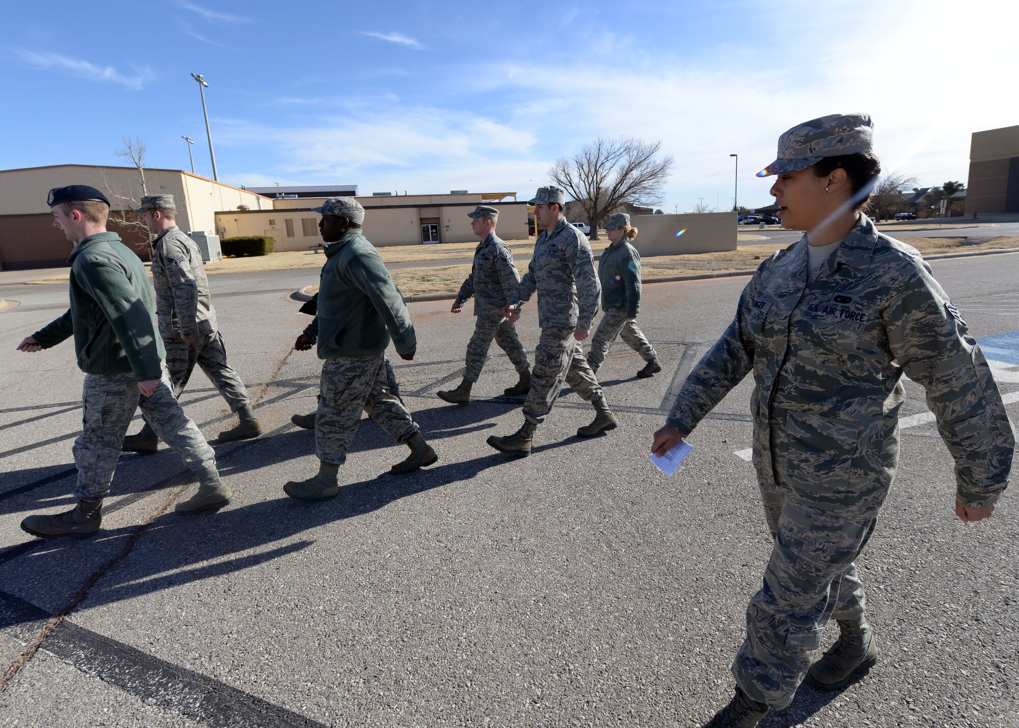 ALTUS AIR FORCE BASE, Okla. – U.S. Air Force Senior Airman Mariah Hullinger, 452nd Logistics Readiness Squadron, marches a formation at the Airman Leadership School parade training area Jan. 15, 2014. Hullinger traveled from March Air Reserve Base, Calif. Airmen spend five weeks developing leadership abilities and learning to become effective communicators. (U.S. Air Force photo by Senior Airman Levin Boland/Released)