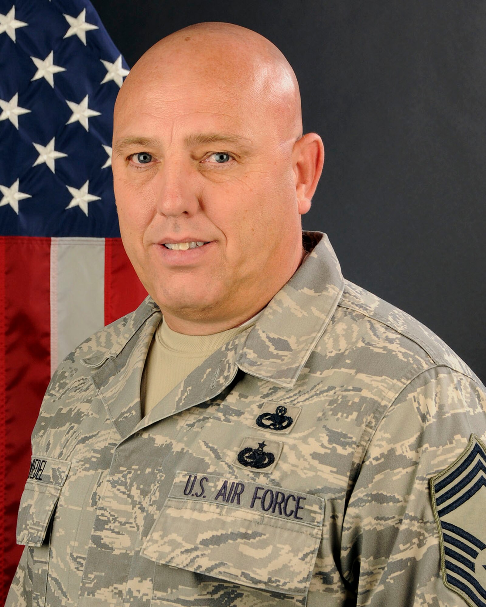 U.S. Air Force Chief Master Sgt. Peter Wiedel, with Joint Forces Headquarters, South Carolina Air National Guard, poses for his portrait, Jan. 22, 2014.   (U.S. Air National Guard photo by Tech. Sgt. Caycee Watson/Released)