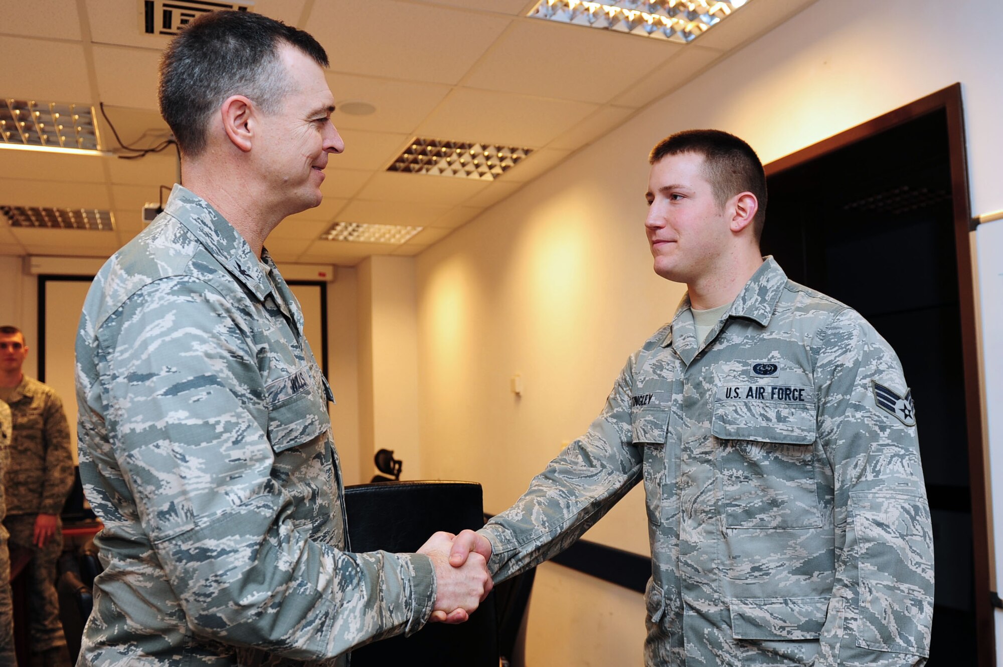Senior Airmen Nathan Tingley, 39th Communications Squadron cyber transport systems technician, is awarded the "Pick of the 'Lik" for the week of Jan. 20, 2014, at Incirlik Air Base, Turkey. The 39th Air Base Wing leadership recognizes Airmen for demonstrating outstanding leadership and job performance abilities. (U.S. Air Force photo by Airman 1st Class Nicole Sikorski/Released)