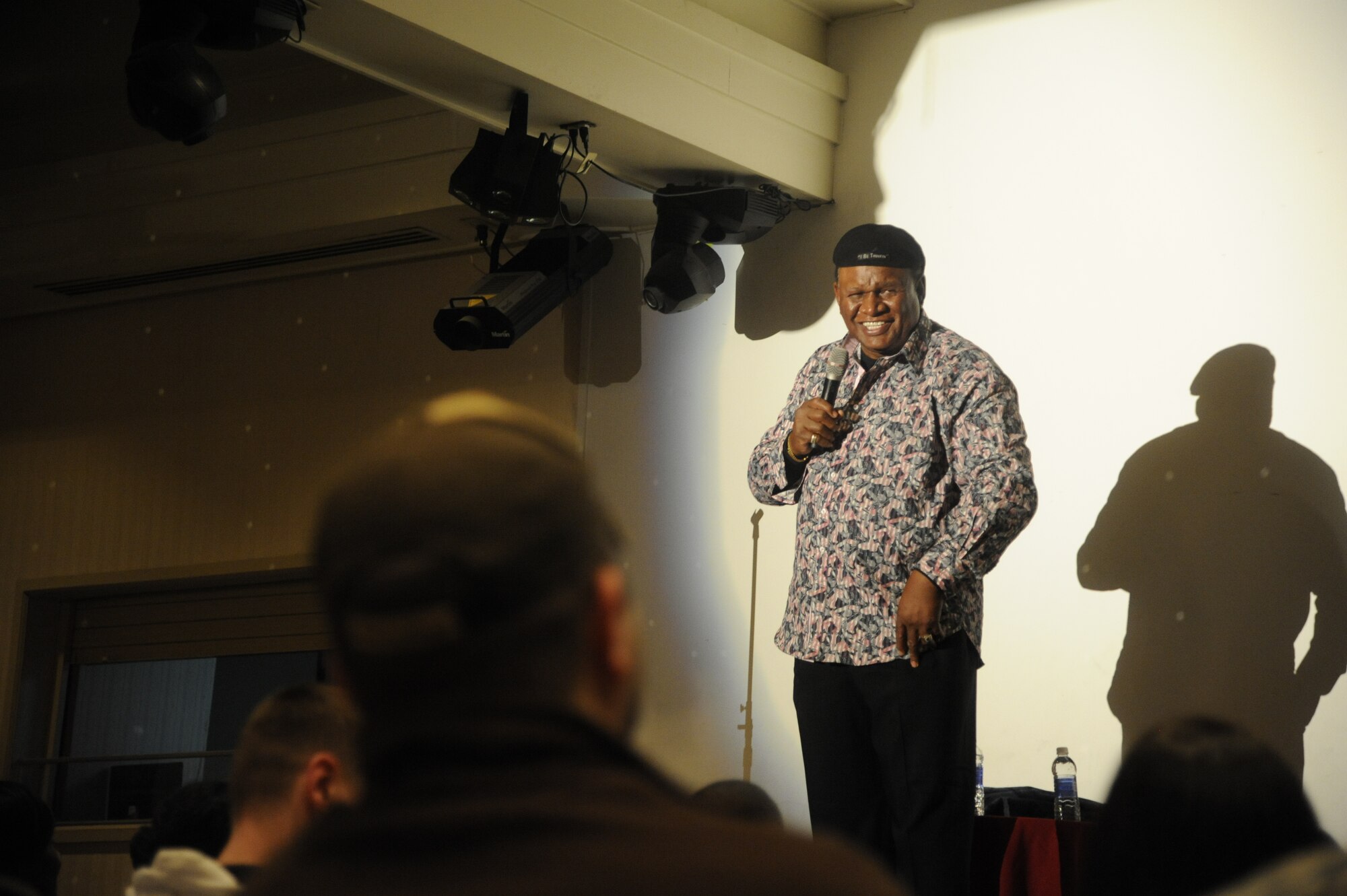 George Wallace, a Las Vegas-based comedian, performs for the Wolf Pack during a visit to Kunsan Air Base, Republic of Korea, Jan. 29, 2013. The Armed Forces Entertainment brought George Wallace to Kunsan to entertain the troops the Wolf Pack with laughter. (U.S. Air Force photos by Staff Sgt. Jessica Haas/Released)