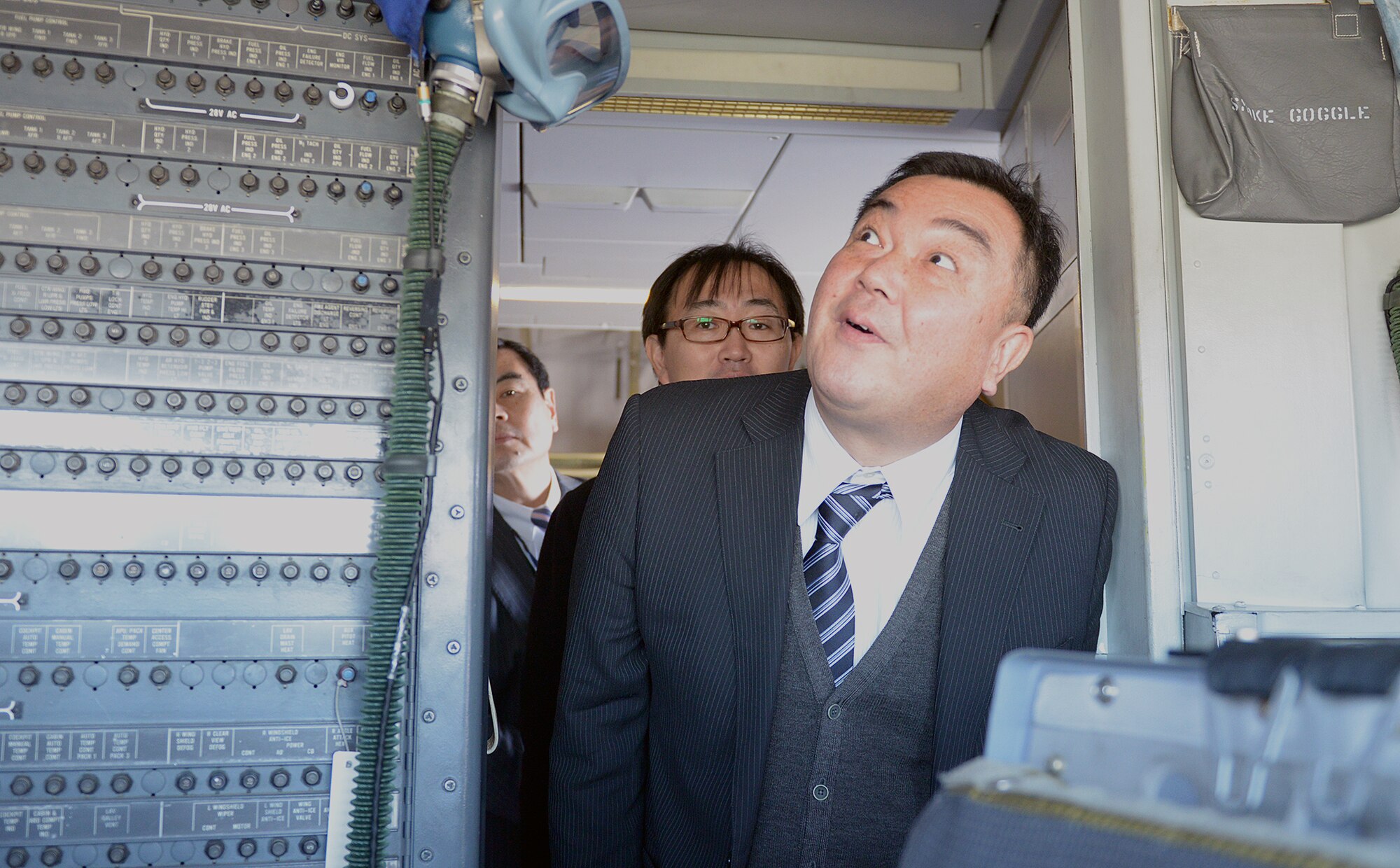 Members of the Vice Mayors Council explore the cockpit of the KC-10 Extender at Yokota Air Base, Japan, Jan. 29, 2014. The tour is held annually to foster stronger ties with the local community. (U.S. Air Force photo by Airman 1st Class David Danford/Released)

