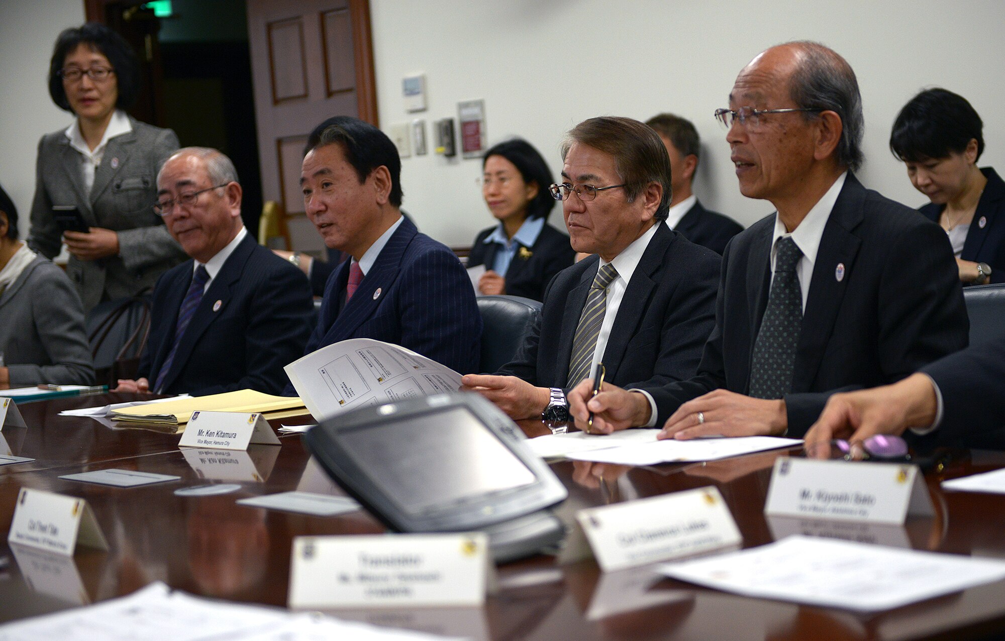 Members of the Vice Mayors Council attend a briefing at Yokota Air Base, Japan, Jan. 29, 2014. The forum addressed the concerns of local Japanese citizens brought forth by their representatives to base leadership. (U.S. Air Force photo by Airman 1st Class David Danford/Released)
