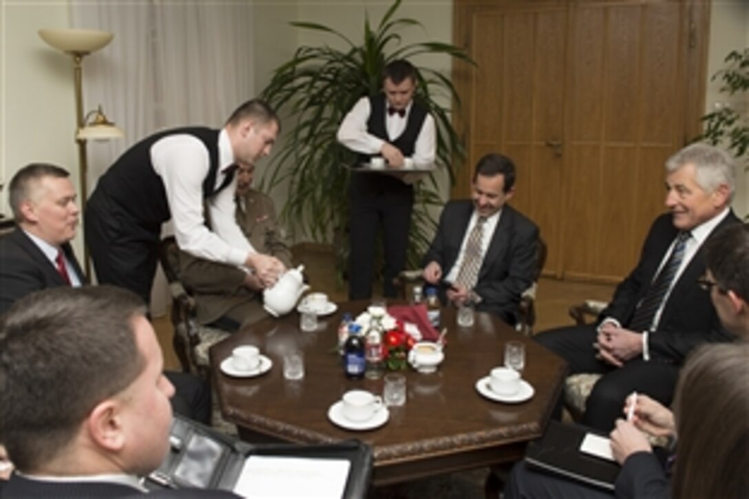 U.S. Defense Secretary Chuck Hagel, right, meets with Polish Defense Minister Tomasz Siemoniak at the  Ministry of National Defense in Warsaw, Poland, Jan. 30, 2014. Hagel is on a trip to Europe to meet with defense leaders and attend the 50th Munich Security Conference.