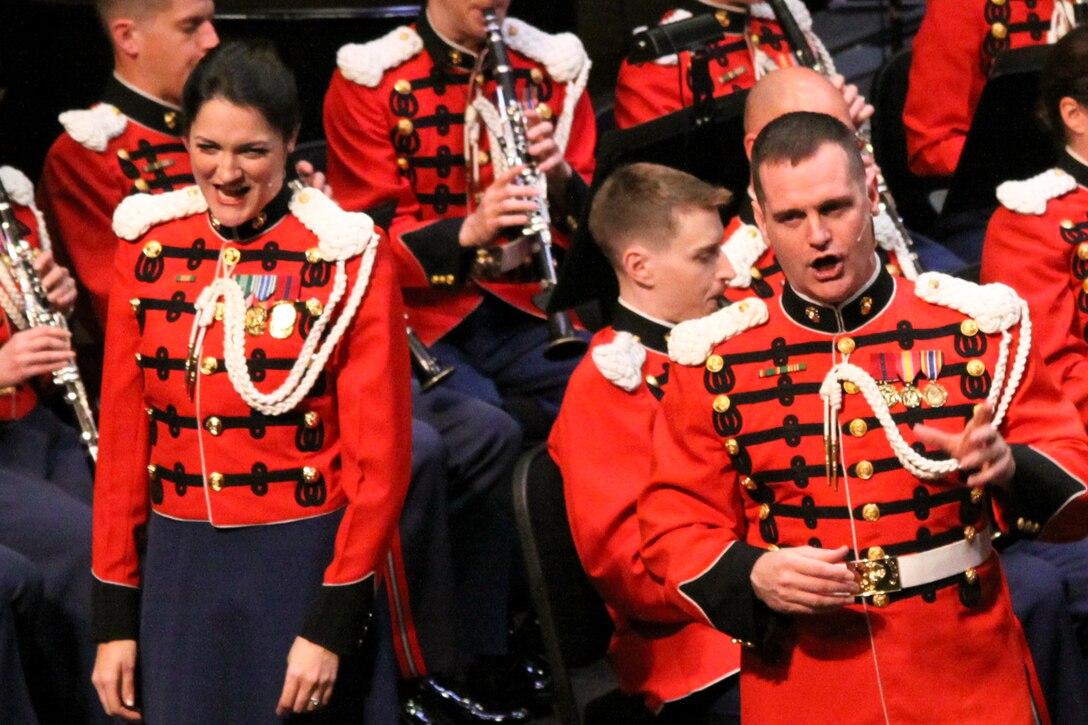 Marine Band vocalists Master Sgt. Kevin Bennear and Gunnery Sgt. Sara Dell'Omo, as part of a combined military chorus, will back up soprano Renée Fleming as she sings the National Anthem at the Super Bowl on Feb. 2, 2014.(U.S. Marine Corps Photo/Master Sgt. Kristin duBois, released)