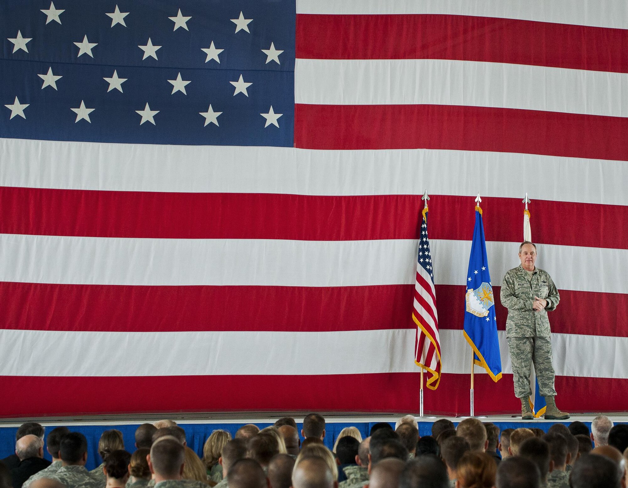 Air Force Chief of Staff Gen. Mark A. Welsh III speaks to an Airman in the audience during an all call Jan. 27, 2014, at Eglin Air Force Base, Fla. Welsh, along with his wife, Betty, spent two days meeting Airmen and their families, and learning about the missions of the various units at the base including the 53rd Wing, 96th Test Wing and 33rd Fighter Wing.  (U.S. Air Force photo/Samuel King Jr.)