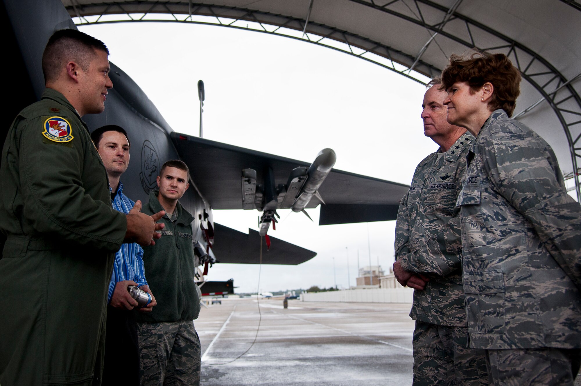 Maj. Ryan Sanford briefs Air Force Chief of Staff Gen. Mark A. Welsh III and Gen. Janet Wolfenbarger about the mission of the 40th Flight Test Squadron Jan. 27, 2014, at Eglin Air Force Base, Fla. The generals received the brief as part of a developmental and operation test orientation to the 96th Test Wing and the 53rd Wing. Wolfenbarger is the Air Force Materiel Command commander and Stanford is an F-15 Strike Eagle pilot with the 40th FTS. (U.S. Air Force photo/Samuel King Jr.)