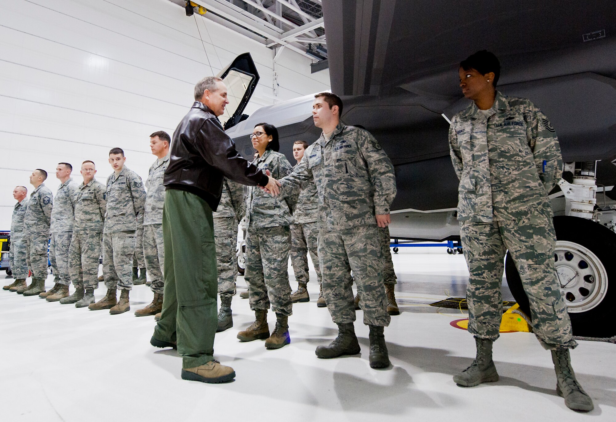 Air Force Chief of Staff Gen. Mark A. Welsh III meets 33rd Fighter Wing maintainers, who work on the F-35 Lightning II joint strike fighter Jan. 28, 2014, at Eglin Air Force Base, Fla. Welsh held a candid discussion with the maintainers and pilots on the successes and challenges they’ve faced while working on the Air Force’s newest weapons system. (U.S. Air Force photo/Samuel King Jr.)