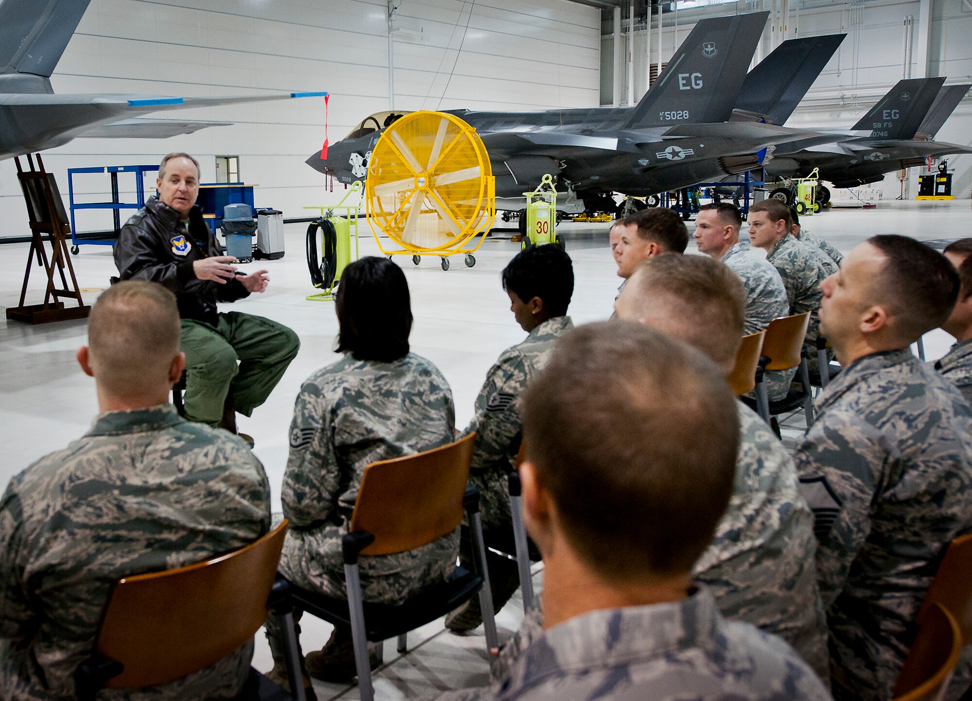 Air Force Chief of Staff Gen. Mark A. Welsh III talks with 33rd Fighter Wing maintainers about the F-35 Lightning II, Jan. 28, 2014, at Eglin Air Force Base, Fla. Welsh held a candid discussion with maintainers and pilots on the successes and challenges they’ve faced while working on the Air Force’s newest weapons system. (U.S. Air Force photo/Samuel King Jr.)