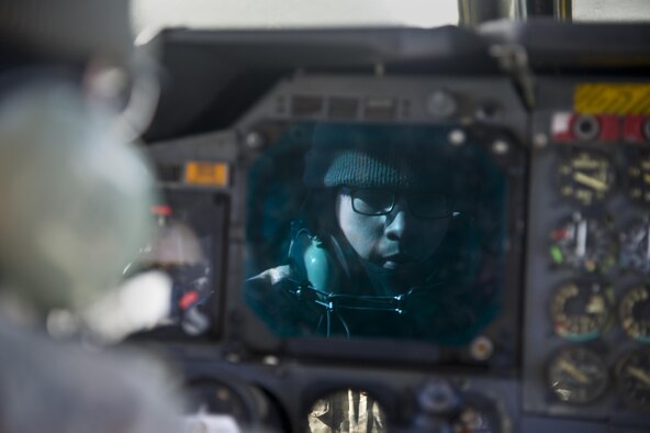 A crew chief from the 5th Aircraft Maintenance Squadron sits in the cockpit of a B-52H Stratofortress during a one-on-one training session with Tech. Sgt. Christopher Ramsauer, Jan. 23, 2013, at Minot Air Force Base, N.D. Training is conducted daily and class sizes range from as few as one to 10 students. Ramsauer is a 372nd Training Squadron, Det. 22 crew chief instructor. (U.S. Air Force photo/Senior Airman Brittany Y. Auld)