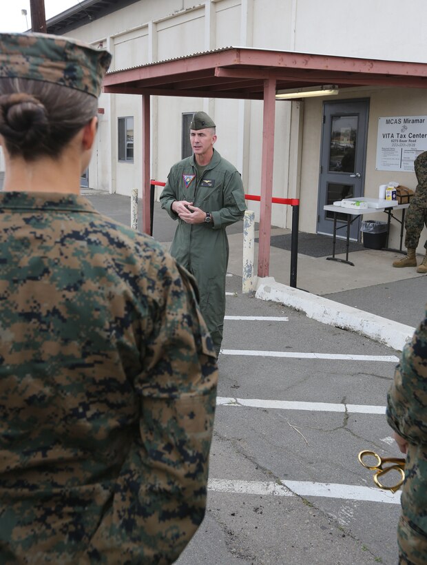 Col. John Farnam, commanding officer of Marine Corps Air Station Miramar, speaks to the Marines before the grand opening of the Volunteer Income Tax Assistance Tax Center aboard MCAS Miramar, Calif., Jan. 30. The Marines have been training since December and are certified by the Internal Revenue Service. The services are free of charge for active-duty service members, retirees and military spouses. For more information call 858-577-1040.