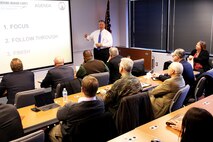 Michael Halloran, director of science and technology at Program Executive Officer Land Systems, addresses business representatives Jan. 30 at the Industry Interface Council in Dumfries, Va. Led by Marine Corps Systems Command, the council meets quarterly to enhance the command's effectiveness and glean ideas and feedback from industry leaders about improving communications.