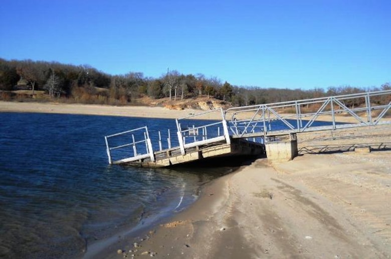 A boat dock at Preston Bend on Lake Texoma, usually floating, sits on the lakebed. The lake's low levels are the result of a number of factors: a multi-year drought, low inflows, below normal rainfall, and hydropower and municipal and industrial water supply usage.