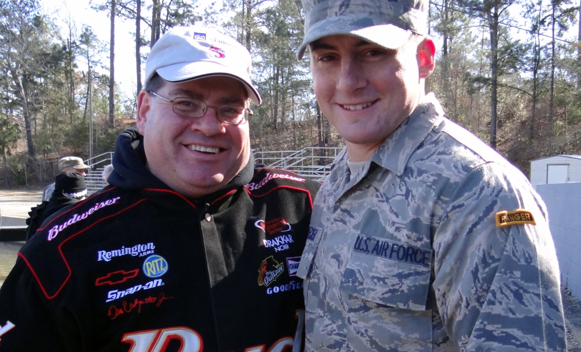 Senior Airman Stephen Becker, a native of Minerva, Ohio, right, poses for a photograph with his father Mike Becker, a former Army Green Beret, Jan. 24, 2014, after graduating from the U.S. Army Ranger School at Ft. Benning, Ga.  Becker is the 257th Airman to graduate from the U.S. Army Ranger School at Ft. Benning, Ga. The purpose of the school is to develop combat skills of selected officers and enlisted men by requiring them to perform effectively as small unit leaders in a realistic tactical environment, under mental and physical stress approaching that found in actual combat. (Courtesy photo)