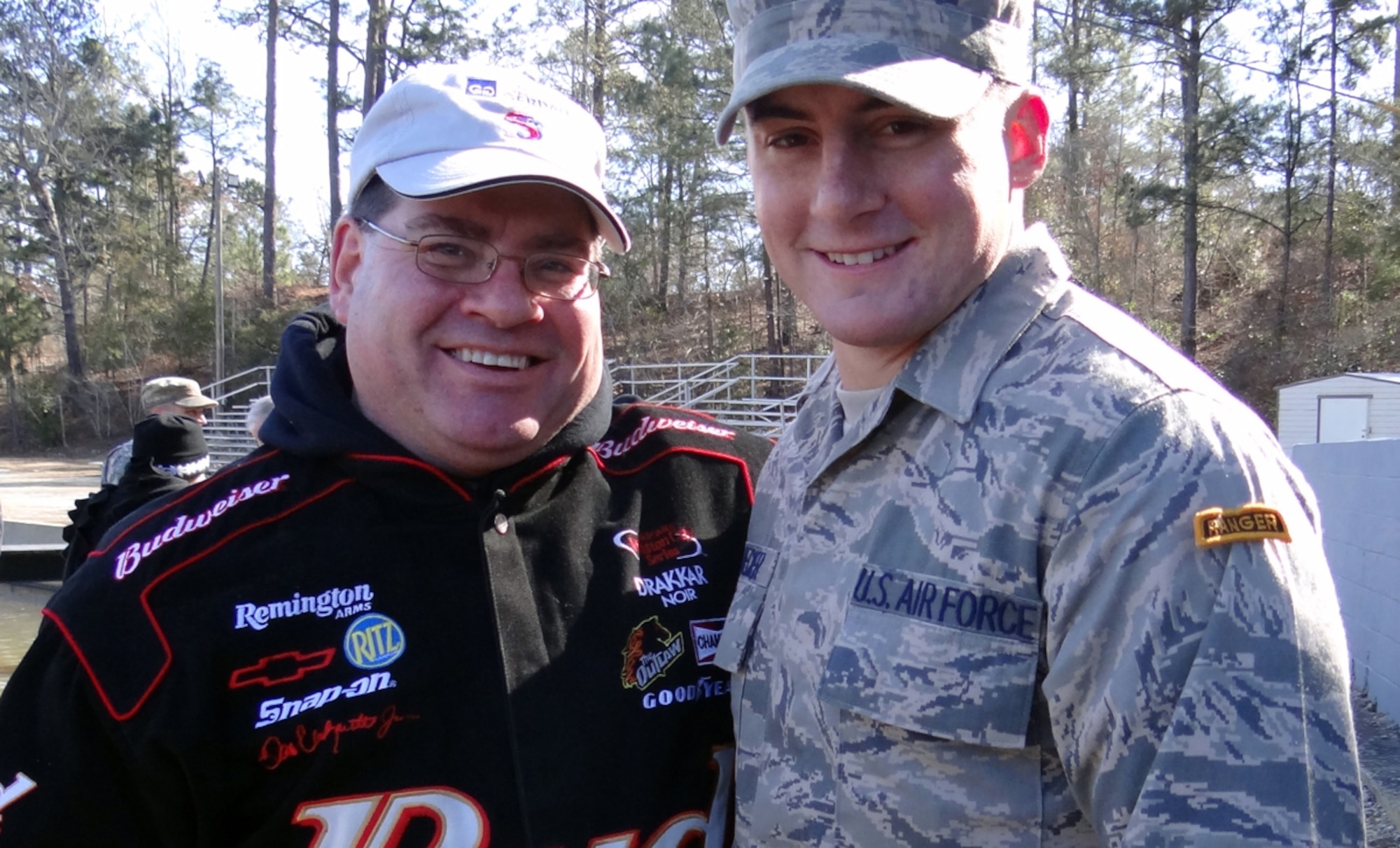 Senior Airman Stephen Becker, a native of Minerva, Ohio, right, poses for a photograph with his father Mike Becker, a former Army Green Beret, Jan. 24, 2014, after graduating from the U.S. Army Ranger School at Ft. Benning, Ga.  Becker is the 257th Airman to graduate from the U.S. Army Ranger School at Ft. Benning, Ga. The purpose of the school is to develop combat skills of selected officers and enlisted men by requiring them to perform effectively as small unit leaders in a realistic tactical environment, under mental and physical stress approaching that found in actual combat. (Courtesy photo)