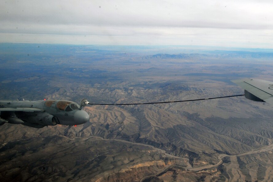 An EA-6B Prowler from Marine Corps Air Station Cherry Point, N.C., is refueled by a KC-135 Stratotanker from Fairchild Air Force Base, Wash., during Red Flag 14-1 Jan. 29, 2014, over the Nevada Test and Training Range. Red Flag is a realistic combat training exercise that incorporates air, space and cyber forces as part of the blue forces and their adversaries, the red forces. (U.S. Air Force photo/Staff Sgt. Veronica Montes)