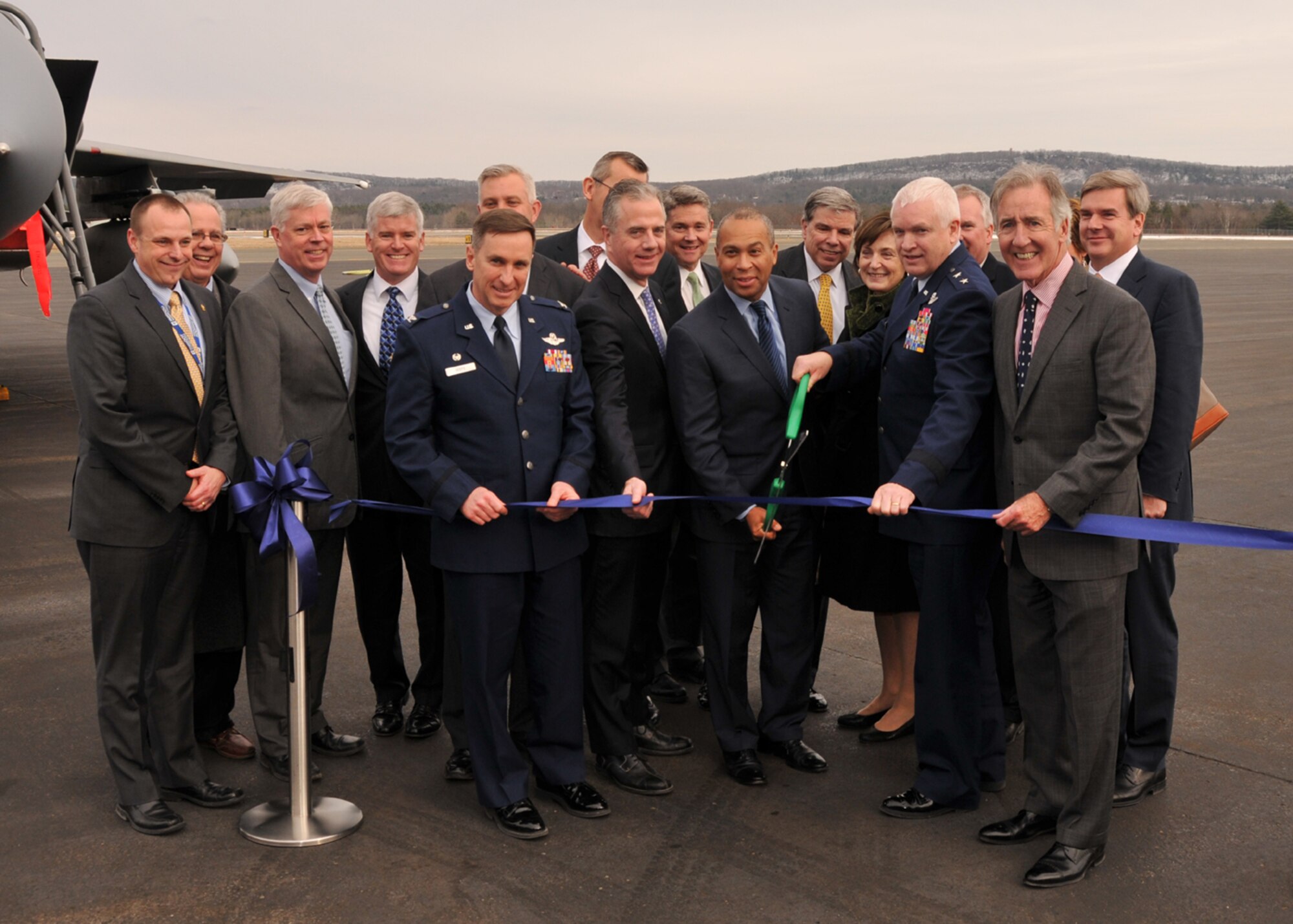 Massachusetts Governor Deval Patrick, U.S. Representative Richard Neal, Maj. Gen. L. Scott Rice, The Adjutant General, Massachusetts National Guard, Col. James J. Keefe, Commander 104th Fighter Wing, Massachusetts Air National Guard, and Brian Barnes, Westfield-Barnes Regional Airport Manager, participate in a runway upgrade ribbon cutting ceremony at Westfield-Barnes Regional Airport, Westfield, Mass. on Friday, Jan. 31, 2014.
Fixing the runway was imperative for safe operations on both the military and civilian sides of the airport, and it took a strategic mix of funding resources from federal, state, and local government agencies to make it a reality.  Completion of this $21 million runway project fills a critical infrastructure need to the airfield jointly used by civilians, industry, and the military, which will help maintain and even increase the positive economic impact to the local area.  (U.S. Air National Guard photo by Senior Master Sgt. Robert J. Sabonis / Released).