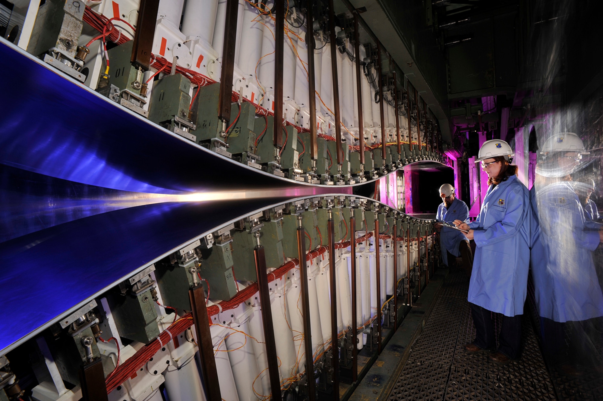 Arnold Engineering Development Complex (AEDC) test engineer, Shannon Tibbals (right) and AEDC outside machinist, Greg Crabtree, get an up-close look at a nozzle in the von Karman’ Gas Dynamics Facility (VKF).  VKF includes Tunnels A, B and C and are unique assets in the United States because they are continuous flow with the ability to sustain maximum speed for several days.  Improved performance, productivity and reduced energy consumption are expected as part of a recent upgrade.