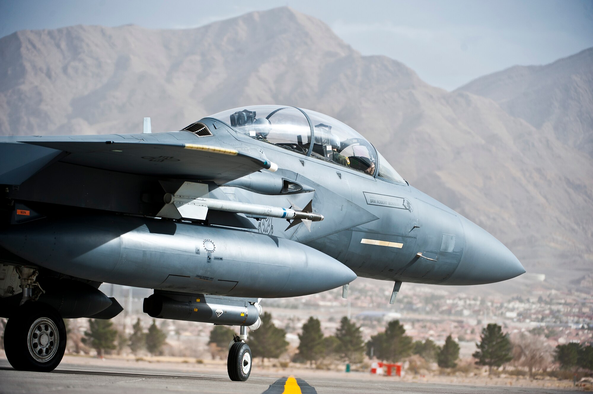 A U.S. Air Force F-15E Strike Eagle from 391st Fighter Squadron from Mountain Home Air Force Base, Idaho, taxis to the runway before a training mission during Red Flag 14-1 Jan. 30, 2014, at Nellis AFB, Nev. The purpose of the exercise is to increase the combat capability of U.S. and allied air forces for future conflicts or war. (U.S. Air Force photo/Senior Airman Brett Clashman)
